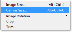 Choosing Canvas Size from the Image menu in Photoshop. Image © 2013 Photoshop Essentials.com