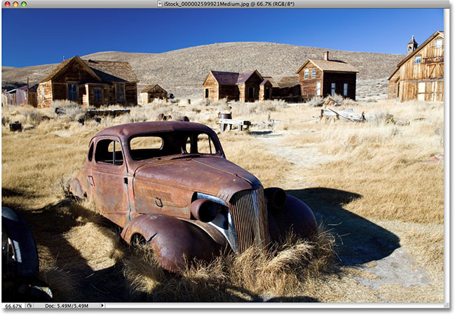 A photo of an old antique car. Image licensed from iStockphoto by Photoshop Essentials.com.