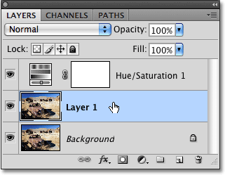 Selecting a layer in the Layers palette in Photoshop CS4.