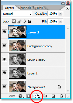 Clicking the 'New Adjustment Layer' icon at the bottom of the Layers palette.