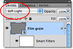 Changing the blend mode of the Film grain layer to Soft Light.