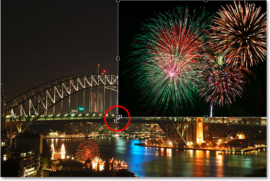 Moving and resizing the fireworks with the Free Transform command in Photoshop.