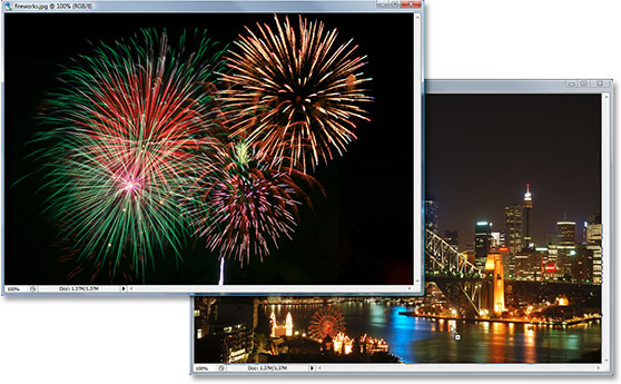 Dragging the fireworks photo into the second photo's document window with the Move Tool.