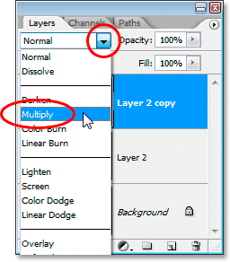 Changing the blend mode of the new layer to 'Multiply'.