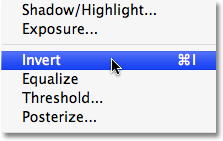 Selecting the Invert command in Photoshop. Image © 2009 Photoshop Essentials.com.