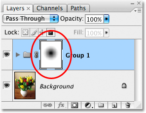 The layer mask preview thumbnail showing the radial gradient. Image © 2009 Photoshop Essentials.com.