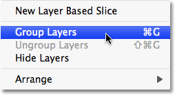 Selecting the Group Layers command in Photoshop CS3. Image © 2009 Photoshop Essentials.com.