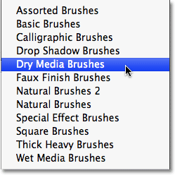 Loading the Dry Media Brushes brush set in Photoshop.