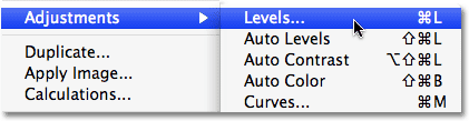 Selecting the Levels command in Photoshop.