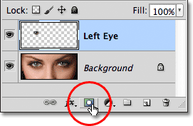 Clicking the Layer Mask icon at the bottom of the Layers panel.