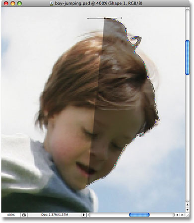 The opacity of the Shape layer is now lowered. Image © 2008 Photoshop Essentials.com.