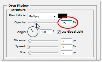 Lowering the opacity value of the Drop Shadow layer style.