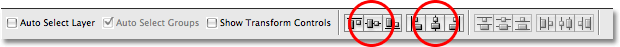 Click on the Align Vertical Centers and Align Horizontal Centers icons in the Options Bar. Image © 2008 Photoshop Essentials.com.