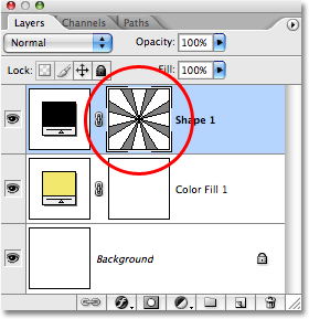 The Layers palette in Photoshop showing the starburst shape on its own Shape layer. Image © 2008 Photoshop Essentials.com.