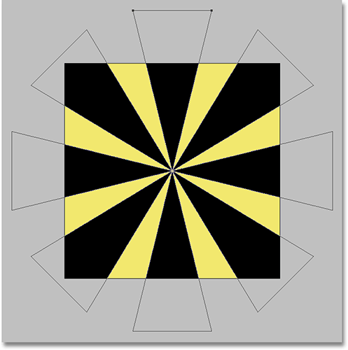 Add more rotated triangles to complete the starburst effect. Image © 2008 Photoshop Essentials.com.