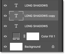 A second black type layer appears below the original text in Photoshop's Layers panel