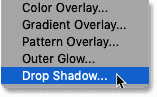 Choosing Drop Shadow from the list of layer effects in Photoshop