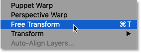 Selecting the Free Transform command from Photoshop's Edit menu