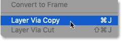 Selecting the 'New Layer via Copy' command in Photoshop