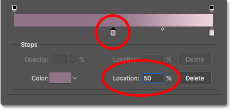 Changing the Location of the left gradient color to 50 percent in Photoshop's Gradient Editor