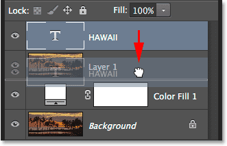Dragging the Type layer below Layer 1 in the Layers panel.