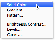Adding a Solid Color Fill layer in Photoshop.