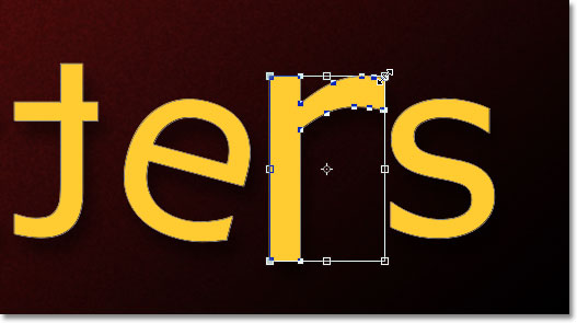 自由変形で「r」の文字のサイズを変更する。 Image © 2011 Photoshop Essentials.com.